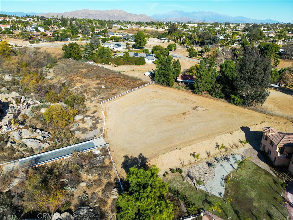 Tucked away at the end of a quiet cul-de-sac in the sought-after Alessandro Heights neighborhood, this gorgeous 1.27-acre lot is ready and waiting for your dream home. Cross your very own private bridge and step into a setting surrounded by some of Riverside’s most beautiful custom homes—where privacy meets stunning views.
The lot is already fully graded and build-ready, with utilities right at the street. Soil and percolation testing had been previously completed, and the seller is even including a full set of custom home plans if the buyer wants them. They’ve already been approved by the City and HOA once—just resubmit them for a quicker approval process if you’d like to use them.
In this neighborhood, homes are at least 3,500 sq ft, with most averaging around 5,863 sq ft, so you’ll be in great company. Plus, you’ll enjoy low property taxes and a super affordable $45/month HOA fee.
Opportunities like this don’t come around often in one of Riverside’s most prestigious neighborhoods. Bring your vision, and let’s make it a reality—come see it for yourself!
