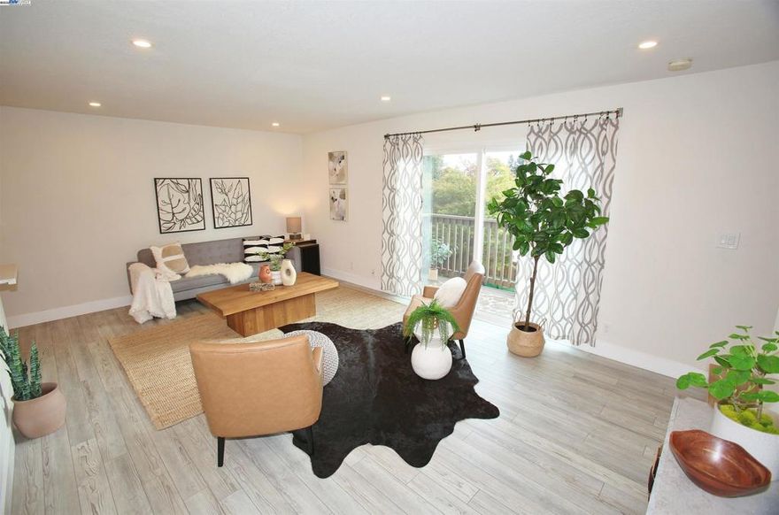Modern Tri-Level Condo with a View  Discover this beautifully updated, three-story condo, perfect for modern living. This 2-bedroom, 1.5-bath residence offers a thoughtful layout that maximizes space and comfort.  Step inside to a fully updated home featuring, solid surface countertops, stainless steel appliances, and a gas stove—ideal for any home chef. The kitchen also includes a convenient breakfast bar for casual dining. Both bathrooms have been tastefully updated with modern fixtures.  One of the standout features is the large, private patio, providing an exceptional space for outdoor entertaining or simply relaxing in the fresh air. Enjoy your morning coffee or evening cocktails with a view.  The home boasts 1,168 sq ft of living space and includes a two-car garage with additional storage space. A washer and dryer are also included, adding to the convenience and an owned Solar System!  Located just minutes from local shopping centers and a variety of restaurants, this home offers the best of urban convenience. With easy access to the 580 and 880 freeways, commuting is a breeze.  Don't miss the opportunity to own this fantastic condo that perfectly blends style, function, and a great location.