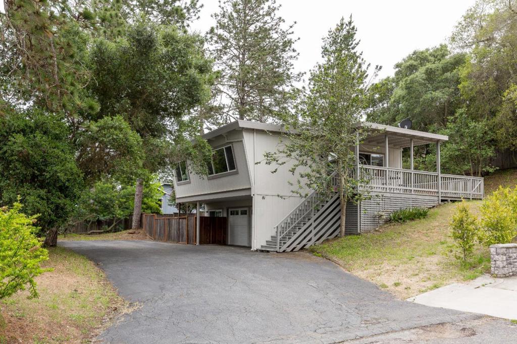 Centrally located, newly refurbished home situated on a sunny 10K+ sq ft lot at the top of a quiet cul-de-sac just minutes from schools, shops, restaurants and Hwy 17. Two bedrooms upstairs, with new paint and floor coverings, stainless steel appliances, inside laundry hook-ups, forced air heating and air conditioning system, dual pane windows, and relaxing views of the trees. A large wraparound deck provides ample room for entertaining. Downstairs, a studio apartment with separate entrance, easy access to the backyard, double pane slider, tiled floors, bath and kitchenette. Spacious 2-car garage with plenty of built-in cabinets, plus off-street parking for boat or RV