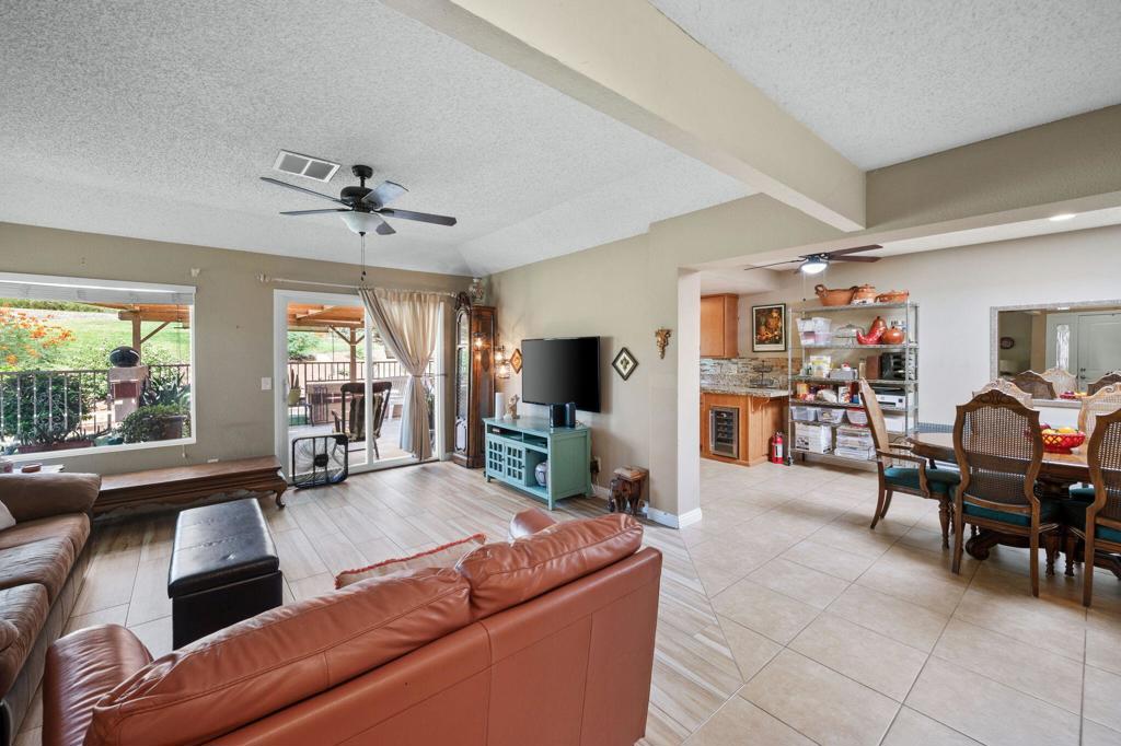 Welcome to this spacious and stylish 2-bedroom, 2-bath condo in the desirable Indian Palms Country Club. Offering 1,440 sq. ft. of well-designed living space, this home features a fantastic floorplan with a large living room--perfect for relaxing or entertaining.The kitchen is outfitted with granite countertops and stainless steel appliances. Both bathrooms have been tastefully updated, and the newer flooring throughout adds a fresh, modern touch.Enjoy indoor-outdoor living with two inviting outdoor spaces: an enclosed front courtyard for added privacy and a large back patio with stunning views of the peaceful stream and greenery--ideal for dining, lounging, or simply soaking in the serene surroundings. One car garage, one car carport, and off street parking. Indian Palms offers a gated resort-style lifestyle with amenities including 27 holes of golf, multiple pools and spas, tennis and pickleball courts, a fitness center, clubhouse, and on-site restaurant. Located close to shopping, dining, and the Empire Polo Grounds--home of world-famous festivals--you'll enjoy comfort, convenience, and community all in one place.
