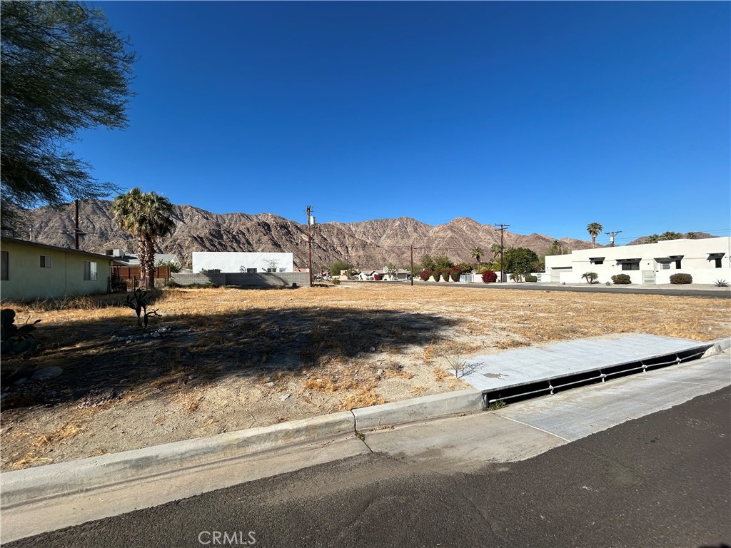 Build your dream home or investment property in the heart of the highly desirable La Quinta Cove! This 5,227 square foot lot is nestled against the backdrop of breathtaking mountain views and is located near scenic hiking trails, parks, and the shops and restaurants of charming Old Town La Quinta.
This parcel is in a prime location with no HOA fees and utilities nearby, offering a fantastic opportunity for custom home builders, investors, or anyone looking to create their desert escape. Even better – adjacent lots are also available for sale, offering a rare chance to expand your footprint or develop multiple properties side-by-side in one of La Quinta’s most sought-after neighborhoods. Don’t miss out on this exceptional opportunity to invest in the beauty and lifestyle of La Quinta Cove!