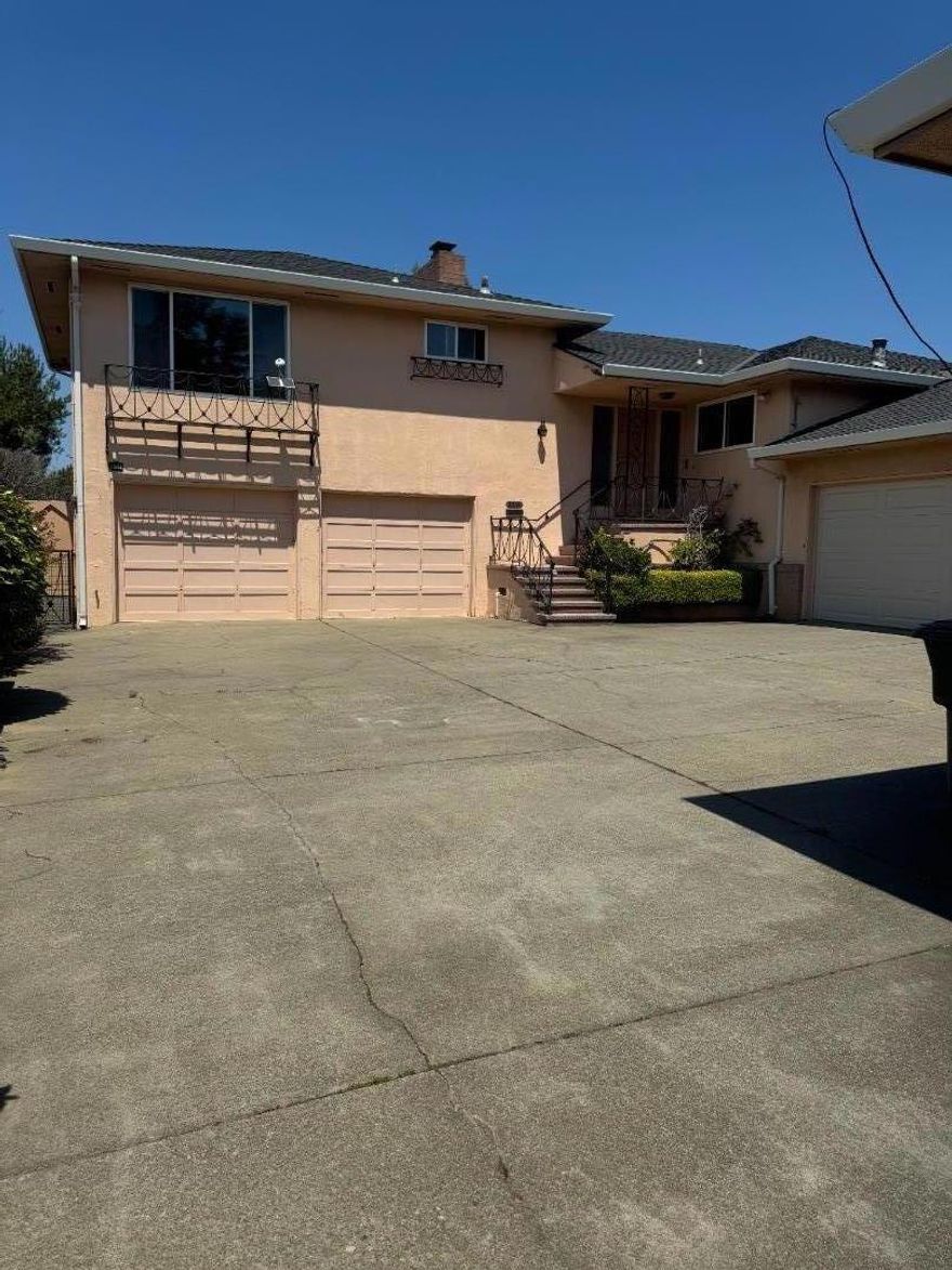Older Raay Park Split level  Charmer Freshly painted hardwood floors 2br 2.5 ba Mbr has double Closet 2nd br has walk in closert FormalLi ing and dining room  Large Family room w wet bar could be 3rd bedroom se[parate laundry room w/d included plus half bath charming older kitchen w eating area 2 car garage plus large workshop enclosed pario off dining and family rooms Across street from Franklin and Burlingame intermediate schools Walk to Mills Hospital shops and CaTrain depot Easy access to hiway 101,2s0 and El Camino Real will Consider pet