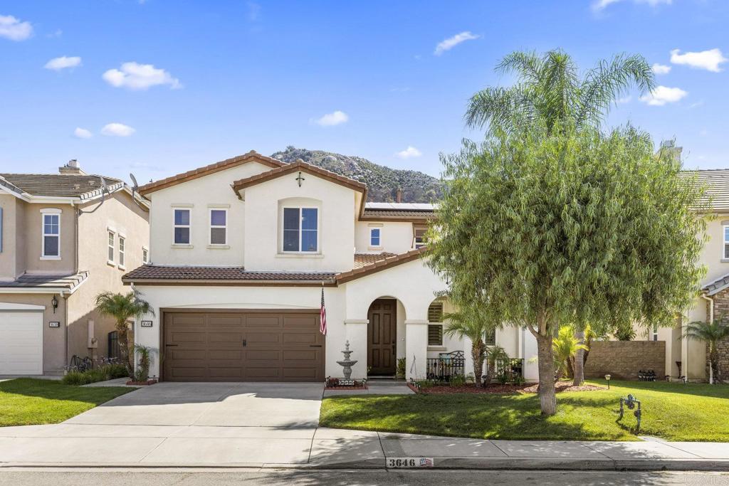 Built in 2007, this 2,945 sq. ft. single-family home offers 4 bedrooms and 3 bathrooms, designed with comfort and everyday living in mind. With leased solar panels, you’ll enjoy energy efficiency while keeping your home running smoothly year-round. One of the most versatile features of this home is the downstairs bedroom with its own full bathroom. Connected to it is an adjoining room that can serve as an office, a den, or even a private living space—ideal for multi-generational living, guest quarters, or anyone who wants added privacy. Step inside and you’ll find a spacious layout that gives everyone room to spread out while still keeping a warm sense of togetherness. The fenced backyard is perfect for weekend barbecues, a safe space for kids and pets to play, or just a quiet retreat at the end of the day. Then relax in the hot tub, or enjoy the firepit under the evening sky. The home is also tucked away in a cul-de-sac. But what truly sets this home apart is the community it’s a part of. This is more than just a neighborhood—it’s a place where families grow together. There are playgrounds for children, scenic walkways for evening strolls, BBQ areas where neighbors gather, and at the very center, a beautiful lake that brings everyone together. Throughout the year, neighbors host activities and events that make this community feel connected and welcoming. The location is as convenient as it is desirable. Just off I-15 and Highway 76, you have quick access to shopping, dining, and major job centers while still being close to award-winning schools. A handful of local wineries and outdoor escapes add to the lifestyle, offering weekends filled with discovery right at your doorstep. From the school bus that picks up children inside the neighborhood to the sense of belonging that comes from an active community, this home blends space, convenience, and connection. It’s not just a place to live—it’s the lifestyle you’ve been looking for.