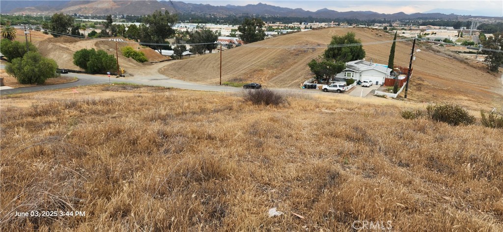 This spacious lot offers the perfect canvas to create your custom home. Enjoy breathtaking views and the convenience of water and power readily available at the street—easily accessible and ready for development.
This exceptional 15,364 sq ft lot offers a rare opportunity to create your own custom residence in a serene setting. Originally comprised of four separate parcels, the property has been officially merged into one expansive lot (per Certificate of Parcel Merger). Key development steps have already been completed, including a perc test and geotechnical/soil reports, saving you time and money in the planning process. The lot has also been professionally surveyed, with boundary markers in place. Don’t miss this chance to own a ready-to-build homesite with incredible potential and sweeping views!