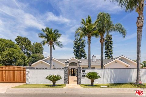 Photo of 22623 Califa Street, Woodland Hills, CA 91367 (MLS # 25612323) Photo of 22623 Califa Street, Woodland Hills, CA 91367 (MLS # 25612323)