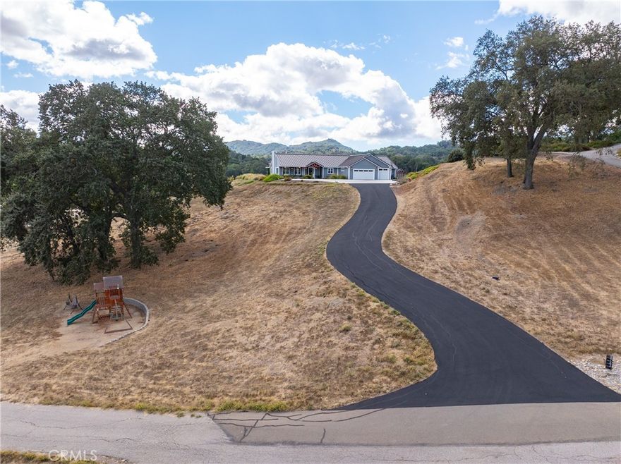 On the desirable westside, this six-year-old custom home was designed to showcase its incredible views while offering comfort, style, and thoughtful details throughout. Set on 3.75 acres, the 4-bedroom, 3-bath layout blends open living with private spaces for everyone.



Inside, 9-foot ceilings, 8-foot doors, and walls of glass create a light-filled atmosphere that flows seamlessly to the outdoors. The kitchen is a chef’s delight with a 6-burner stove and griddle, double ovens, quartz counters, custom cabinetry, and a generous center island with seating. A mudroom/pantry area and large laundry room with sink and storage make daily living effortless.



The primary suite feels like its own retreat with two walk-in closets complete with built-ins and a zero-entry shower. The hall bath also offers a zero-entry shower, beautifully tiled floors, and quartz counters. Three additional bedrooms are tucked into a private wing along with a flexible hangout/playroom area, while an office provides convenient work-from-home space.



Outdoor living is just as inviting—enjoy a covered patio with built-in gas BBQ and fridge, gas firepit, and hot tub, all framed by expansive westside views. A garden with fruit trees, metal roof, and a whole-home speaker system (indoors and out) add to the appeal. Wide hallways and thoughtful design make the home ADA-friendly without sacrificing style.



A rare opportunity to own a modern westside home with views, quality, and comfort in every detail.  PROFESSIONAL VIDEO COMING SOON!