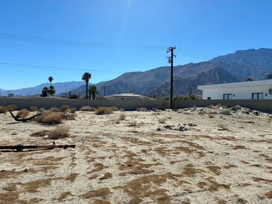 Incredible Panoramic Mountain View Lot. Whether you are a builder, investor or homeowner, this prime vacant lot delivers immediate value and lasting potential. Minutes to downtown Palm Springs dining and shopping, 1 block to James O. Jessie Park and bus routes are nearby.