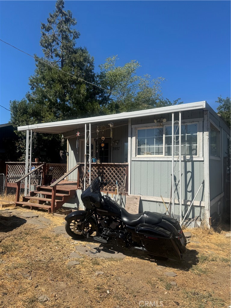 Opportunity awaits you to live in beautiful Clearlake! This gorgeous home is close to shopping, walking distance to the school, has a fully fenced in yard, and all for a desirable price under 200K! 433A permanent foundation on file, and a newer roof with a lifetime warranty from Humberto's roofing, this home is ready to move into and enjoy today! The front opens up with beautiful french doors to the front yard, and inside is a warm, inviting open concept living space. The newer laminate floors feel and look like wood, and give a great warm glow to the ambiance of the home. The kitchen is gorgeous with a propane range and lots of counter space, new cabinets, and recessed lighting. Mini splits for efficient, ductless heat/air. New double pane vinyl windows add to efficiency and beauty of the home. The bathroom is a dream, with a corner fit large jetted tub, tiled all the way up to the ceiling, adding elegance and functionality to the bathroom. Primary suite has its own full bath as well! Behind the home in the nicely shaded back yard is a detached granny unit with lots of potential, it also has a full bath. Shed for your tools included. Don't miss out on this opportunity to own a home for under 200K, in a desirable convenient location, with all these upgrades already done for you! Clearlake is only 2 hours away from the bay area, and Sacramento, and is home to the largest natural lake in California, also voted one of the top bass fishing lakes in the country, and the world.