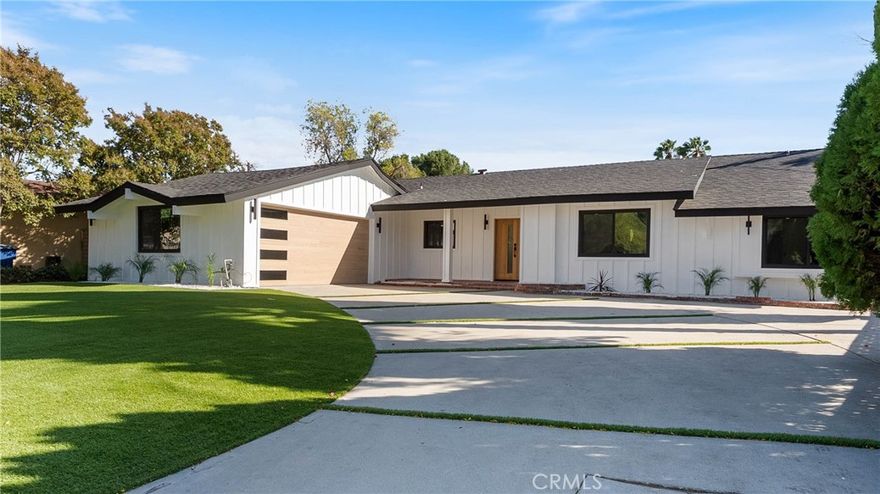 Welcome to this modern luxury retreat tucked away on a peaceful cul-de-sac in West Hills. With 4 bedrooms, 2 bathrooms, and 2,237 sq. ft. of designer living space on a 0.26-acre lot, this residence combines sophistication, comfort, and resort-style living in one remarkable property.

Inside, soaring ceilings and an open-concept floor plan set the tone for elegant gatherings and relaxed family living. The spacious dining room showcases a stunning chandelier and custom wood-paneled ceiling detail, flowing seamlessly into the expansive living room and custom bar. The chef’s kitchen is a true showpiece, featuring a 6-burner island cooktop with range hood, built-in microwave, refrigerator, dishwasher, and abundant white oak cabinetry.

The primary suite offers a spa-like sanctuary with a walk-in shower, soaking tub, and expansive walk-in closet, creating the perfect escape at the end of the day.

Outdoors, the property transforms into an entertainer’s paradise with a sparkling pool surrounded by swaying palm trees, a mini golf area, spacious turf yard, and a covered patio with dual fans for year-round enjoyment.

Located in a private, family-friendly neighborhood just minutes from Topanga Mall, The Village, scenic parks, and top-rated schools, this home offers the ultimate blend of modern elegance and California lifestyle.