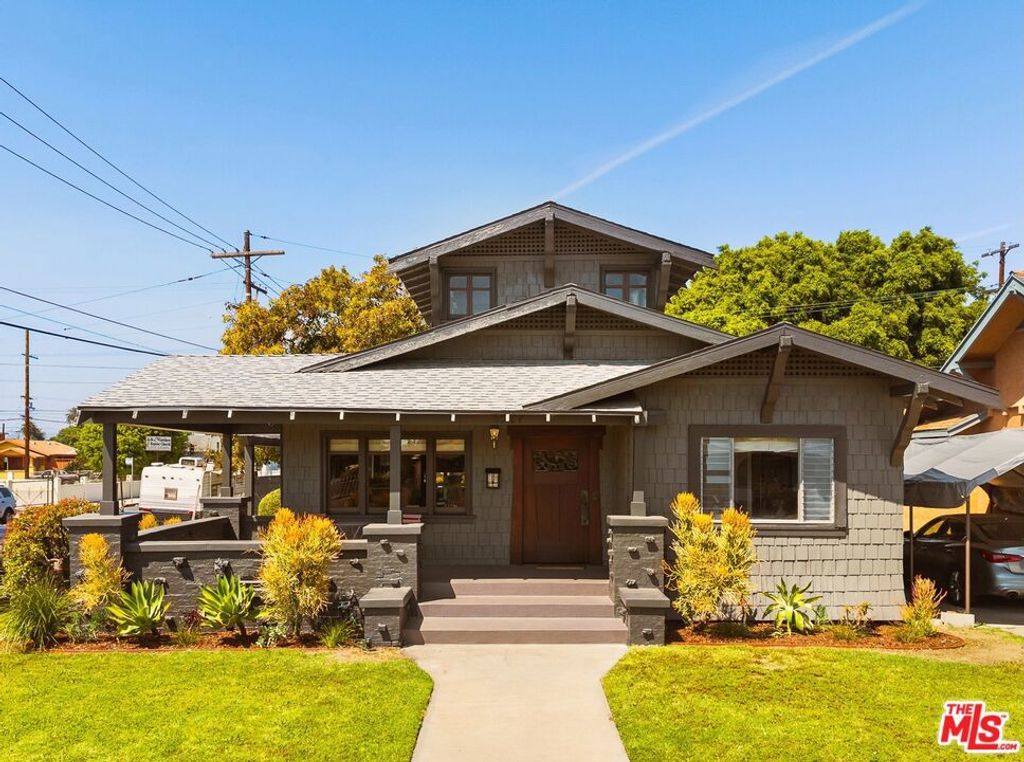 Photo of 1527 W 45th Street, Los Angeles, CA 90062 (MLS # 26697625)