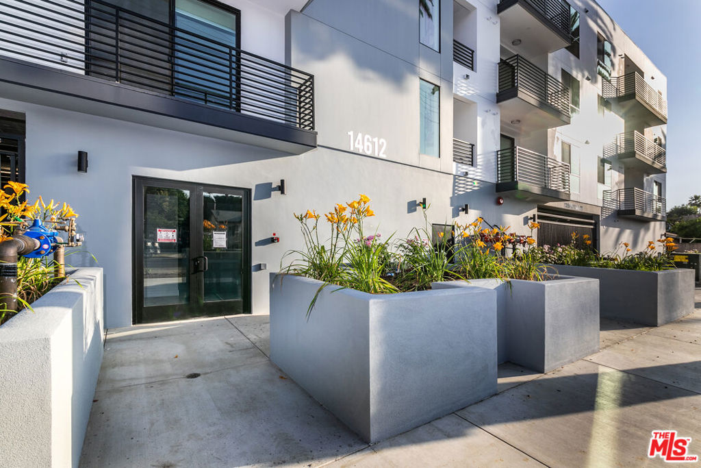 Freshly painted! Light & Bright - Sparkling clean and ready for move-in. Modern luxury living nestled in the heart of Van Nuys with 2 bedrooms, 2 bathrooms and city/mountain views. Built in 2020 and features quartz countertops, designer backsplash tile, stainless steel appliances (refrigerator, dishwasher, range/oven and microwave), private Washer/Dryer in-unit, Central AC/Heat, recessed lighting, custom shades, and lux-wood-like flooring. Expertly designed to maximize the natural light of sunny California and to enjoy the balcony off of the spacious living room with city and mountain views. This unit includes one (1) gated parking spaces. Building amenities include an elevator, controlled access entry, EV charging, storage rooms (for a separate fee) and a central courtyard. Pets will be considered. Prime location conveniently close to Farm Table Coffee House, the Civic Center, Lake Balboa, parks, archery, Costco, Target, restaurants, shopping, freeways and the famous MacLeod's Brewing Company. Call for additional details.