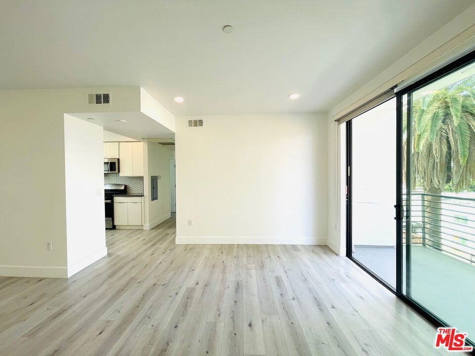 Freshly painted! Light & Bright - Sparkling clean and ready for move-in. Modern luxury living nestled in the heart of Van Nuys with 2 bedrooms, 2 bathrooms and city/mountain views. Built in 2020 and features quartz countertops, designer backsplash tile, stainless steel appliances (refrigerator, dishwasher, range/oven and microwave), private Washer/Dryer in-unit, Central AC/Heat, recessed lighting, custom shades, and lux-wood-like flooring. Expertly designed to maximize the natural light of sunny California and to enjoy the balcony off of the spacious living room with city and mountain views. This unit includes one (1) gated parking spaces. Building amenities include an elevator, controlled access entry, EV charging, storage rooms (for a separate fee) and a central courtyard. Pets will be considered. Prime location conveniently close to Farm Table Coffee House, the Civic Center, Lake Balboa, parks, archery, Costco, Target, restaurants, shopping, freeways and the famous MacLeod's Brewing Company. Call for additional details.