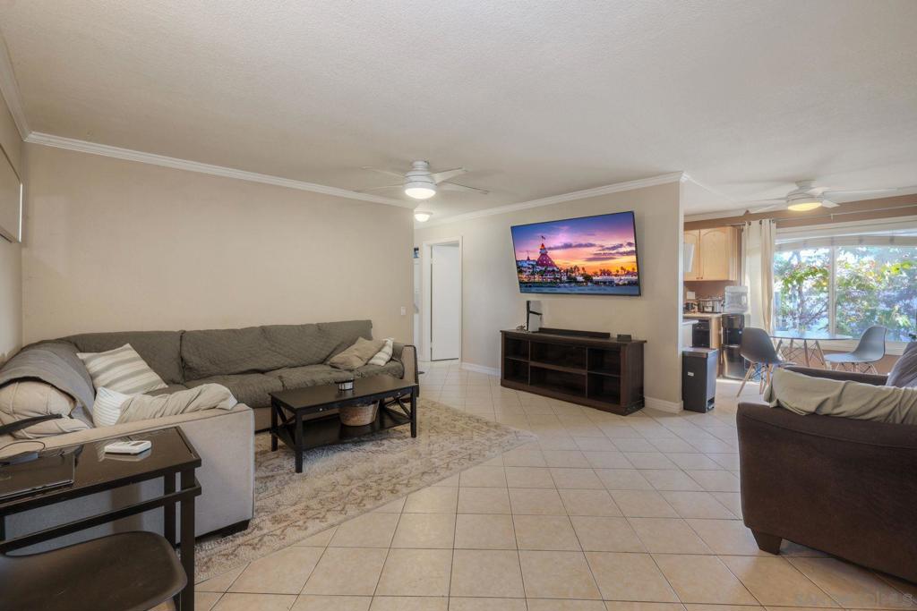 Welcome to your perfect starter home in Lakeside! This spacious 2-bedroom, 1-bath condo features over 840 sq. ft. of living space — tiled floors in the kitchen, living room & bath, plush new carpet in both bedrooms. Cook in style with granite countertops, a large deep sink, and full appliances: fridge, stove/oven, microwave, dishwasher. The remodeled bathroom includes a standalone vanity and a beautifully tiled shower. Cozy up by the electric fireplace in the living room or enjoy the convenience of your stacked washer & dryer—in-unit. VA & Conventional financing both available. Nestled in a small, quiet complex, this home is ideal for first-time buyers or those looking to downsize without compromise. Experience the beauty of Lakeside living: easy access to freeways, shopping, parks, hiking trails, lakes & reservoirs. Outdoor recreation at your doorstep with places like Lake Jennings, El Capitan, plus local rodeo events that celebrate the area’s history. Move-in ready & waiting for someone who wants comfort, value, and community.