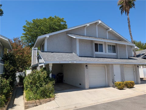 Photo of 25255 Avenida Dorena, Newhall, CA 91321 (MLS # OC26164191)
