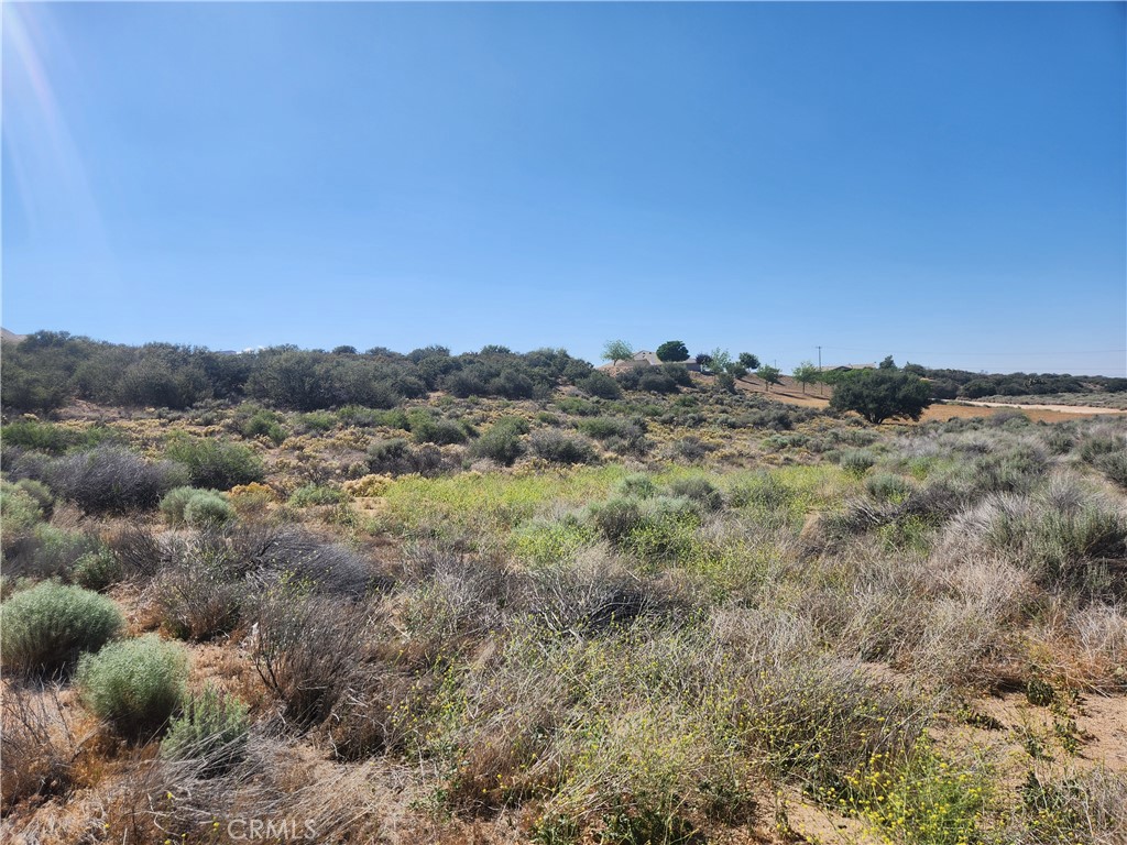 Amazing Oak Hills Lot for sale. With several custom homes within its surrounding area, come design and build your own custom dream home on this horse property. Corner lot with mountain views. Close to FWY 1-15. Buyer and agent to verify utilities and boundaries. Drive by anytime. **Seller MAY consider financing with reasonable offer**