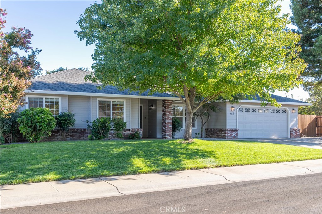 Welcome to Amber Grove~one of Chico’s most desirable neighborhoods at the end of a quiet street. This beautifully maintained 3 bedroom, 2 bath home is perfectly positioned near Peterson Park, restaurants, quality schools, shopping and features an abundance of upgrades. Step inside to find crown molding throughout, laminate flooring in all livings areas, a cozy wood burning fireplace. The kitchen as the heart of the home as been thoughtfully updated with stainless steel appliances, fresh paint and the bathrooms have been updated. A whole house fan, updated light fixtures and a fresh interior paint give the home a clean, modern feel. Outside enjoy the newly refreshed curb appeal sporting a BRAND NEW roof, new exterior paint and a professionally installed yard completed just a few months ago. The backyard is like a park and is ideal for entertaining with a brick fire pit ring, brick walkways, large shaded lawn and a storage shed. The property also offers private gated access to the walking path and no neighbors on one side, providing rare privacy in this neighborhood. Additional features include a two car garage with an additional parking space and full irrigation system. This is the perfect blend of comfort, style and location~move in ready and waiting for its next owner.