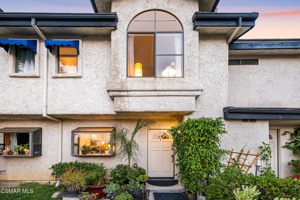 This beautifully remodeled townhome is located in the highly sought-after Lakeview Villas community in Agoura Hills. Tucked beside a tranquil pond and waterfall, the home offers a peaceful, tropical ambiance with a distinct zen-like feel. Thoughtful upgrades and a serene setting make this a true retreat in the heart of Downtown Agoura Hills.The main level features a welcoming living room with a gas fireplace, engineered hardwood floors, and an updated kitchen with quartz countertops, stainless steel appliances, and a lovely view of the surrounding greenery. A private patio surrounded by lush trees and plants offers the perfect space to relax. The full-size laundry is conveniently located in an exterior cabinet just off the patio.Upstairs, soaring ceilings and incredible natural light define the space. The secondary bedroom enjoys beautiful hillside views and an airy, sun-filled atmosphere. The spacious primary suite includes two closets for ample storage and a tastefully updated en-suite bathroom.The home also features a private two-car garage offering secure parking and extra storage. The community offers wonderful amenities including a pool, spa, scenic walking paths, and an onsite dog park, perfect for pet lovers.Located just minutes from Chumash Park, hiking trails, shopping, dining, entertainment, and award-winning Las Virgenes schools, this turnkey home offers a rare blend of style, comfort, and convenience in one of Agoura Hills' most picturesque neighborhoods.
