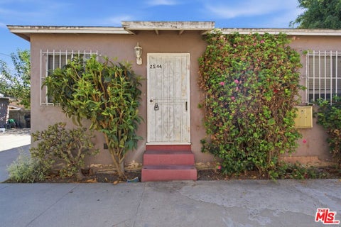 Photo of 2544 Thurman Avenue, Los Angeles, CA 90016 (MLS # 26983469)