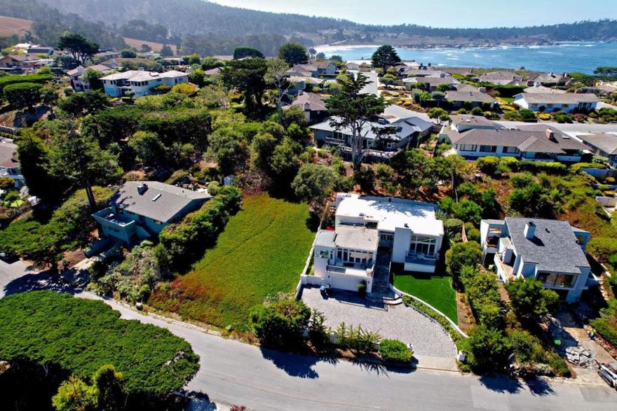 Situated in one of Carmel's most desirable neighborhoods, this rare residential lot, with .4 acre feet of available water, offers an extraordinary opportunity to build your dream home just steps from a spectacular beach. Surrounded by natural beauty and timeless charm, the property is ideally located near both Carmel-by-the-Sea and Pebble Beach, two world-renowned coastal destinations celebrated for their stunning beaches, Michelin-starred restaurants, and legendary golf courses. This is the only lot currently available in the Carmel Meadows, making it a truly exclusive offering. Whether you're drawn to the artistic spirit of Carmel or the prestige of Pebble Beach, this lot is your gateway to the very best of California coastal living.