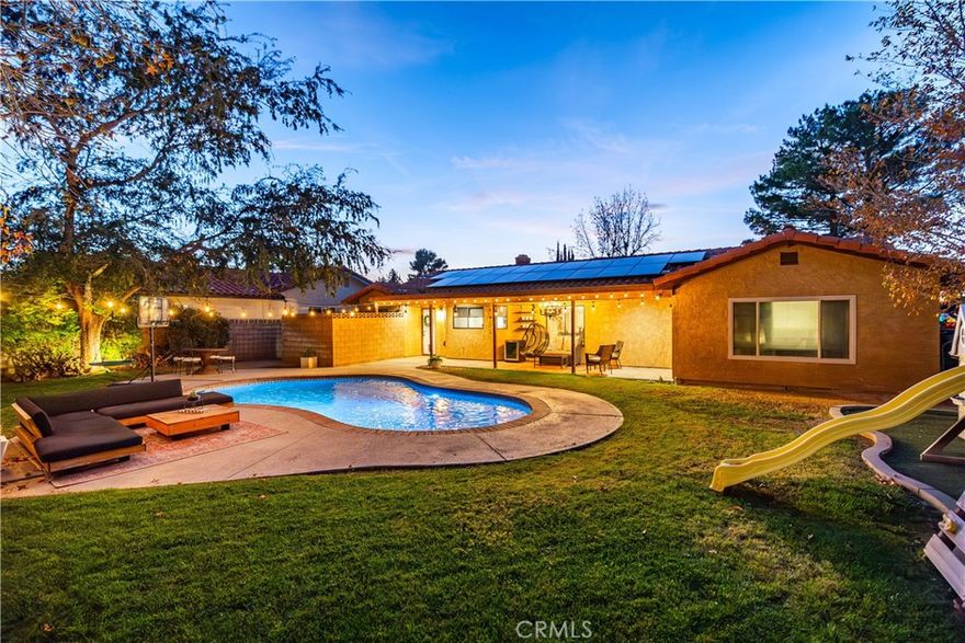 ***LIVE BEAUTIFULLY*** Welcome to this completely remodeled and beautifully upgraded pool home in a quiet and peaceful West Lancaster community! Where modern design meets everyday comfort, every detail has been thoughtfully curated to create a move-in-ready retreat with style and functionality throughout. Step inside to find laminate flooring throughout the home complemented by 6-inch baseboards (excluding bathrooms), creating a clean, contemporary flow. The den is a cozy showpiece featuring a shiplap-accented fireplace with a wood mantle, perfect for relaxing evenings. The remodeled kitchen shines with concrete countertops, a classic subway tile backsplash, and new designer light fixtures, seamlessly tying into the dining area. Additional new light fixtures in all bedrooms enhance the home’s bright and inviting feel. Both living rooms, the kitchen, and the primary bedroom are outfitted with recessed lighting for a sleek, modern ambiance. Bathrooms have been fully upgraded with new tile flooring and tiled showers, paired with elegant quartz countertops for a spa-like finish. Throughout the home, new knobs and hinges add a refined, cohesive touch. The primary bedroom is a true retreat, highlighted by a stunning coffered ceiling. Step outside to your private backyard oasis featuring a sparkling pool with a removable safety fence, artificial turf play area, and mature shrubbery and hedges that provide beauty and privacy. The custom patio is an entertainer’s dream, boasting a custom ceiling with recessed lighting and a wood chandelier, ideal for outdoor dining and evening gatherings. This West Lancaster gem combines modern upgrades, thoughtful design, and exceptional outdoor living—truly a home you don’t want to miss.