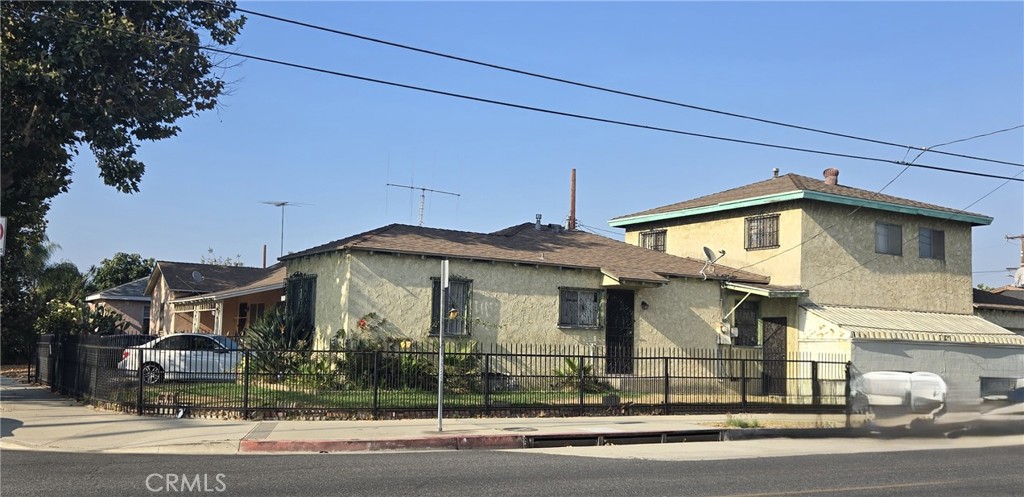 2 story home with a Pool on a tree lined street. A corner lot single family residence originally with 2 bedrooms, 1 full bath and a permitted addition built in 1979 with 2 more large bedrooms upstairs and a 3/4 bathroom, and a large den with a built-in bar, facing the private pool and outside patio. An extra 1/4 bathroom and laundry are in the 2 car Garage. Long driveway and carport for up to 4 cars. Close to freeways and downtown Los Angeles is just minutes away.