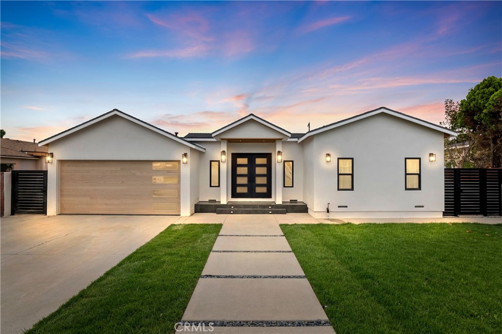 9044 Bigby – North Downey
This spacious 4-bedroom, 3-bath home offers the ideal blend of luxury, comfort, and flexibility in one of Downey’s most desirable neighborhoods. Boasting two luxurious primary suites—each with a full bathroom—this layout is perfect for guests or multigenerational living. The bathrooms have been thoughtfully updated with elegant quartz countertops, richly toned cabinetry, custom mirrors, and modern vanities.
The additional two bedrooms include one oversized room that could serve perfectly as a home office or guest space. The open-concept kitchen is a chef’s dream, featuring custom shaker-style cabinetry, a large center island, quartz countertops, and a cozy dining nook. Designer touches throughout include rich crown molding, stylish lighting fixtures, wood-look flooring, and soothing paint tones that create an atmosphere of sophisticated warmth.
The inviting family room seamlessly into the private backyard oasis. Enjoy year-round entertaining with a rock-accented yard, beautiful stepping stones, a covered patio ideal for al fresco dining BBQ, and a full privacy fence. Additional features include an attached garage with laundry and close proximity to local shopping centers, restaurants, parks, and hiking trails. With convenient commuter access, this is North Downey living at its finest—the perfect package awaits.