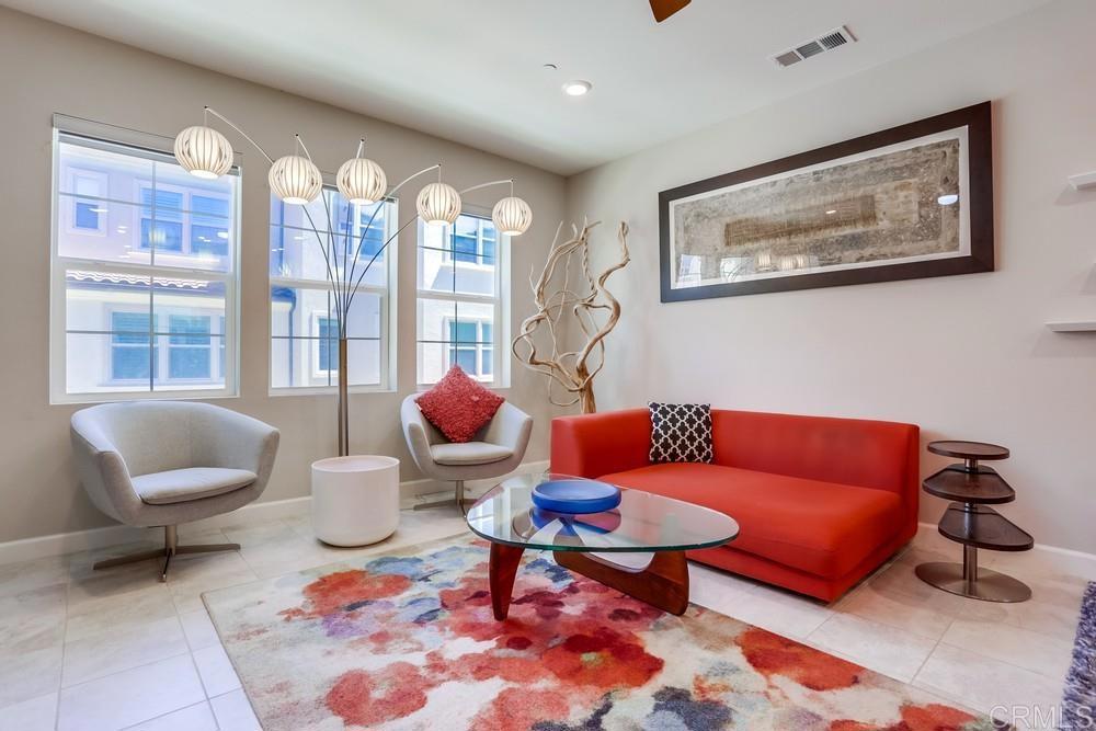 Welcome to 11011 Peyton Way, a stylish and modern home in the heart of Rancho Peñasquitos. This 2 bed, 2.5 bath residence with a spacious den offers 1,612 sq. ft. of beautifully upgraded living space. Designed with an open-concept layout, the living, dining, and kitchen flow seamlessly together—perfect for both everyday living and entertaining. Upgrades include quartz countertops throughout, upgraded tile flooring on the first and second floors, and wood flooring on the third. Every window features custom automated curtains, adding both elegance and convenience. The kitchen is highlighted by a cozy coffee corner with custom removable blackboard wallpaper, while a charming balcony extends your living space outdoors. Located in the highly acclaimed Poway Unified School District, this home is just minutes from shopping, dining, parks, and freeway access. A true blend of comfort, style, and convenience—this is San Diego living at its best!