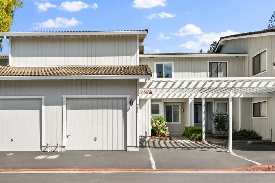Welcome to 766 Pollard Road, Los Gatos - a beautifully updated townhome in the peaceful Pollard Oaks community of just 13 homes. This spacious residence offers 3 bedrooms with vaulted ceilings and generous closets, including a primary suite with en-suite bath and large walk-in closet. The modern kitchen features marble countertops and backsplash, stainless steel appliances, and ample cabinetry space. Enjoy new pet-proof LVP flooring, new dual pane windows and slider, recessed lighting with dimmers, and central heating & cooling throughout. The bright living area features a convenient ground floor powder room and sliding door opens to a large private patio, perfect for relaxing or entertaining. Additional highlights include an attached 1-car garage and custom built-in storage. Prime location - walk to Jack Fischer Park, Los Gatos Creek Trail, and Vasona Station Shopping Center. Easy access to HWY 17 & 85, minutes to Downtown Los Gatos and Campbell, and served by award-winning Marshall Lane Elementary, Rolling Hills Middle, and Westmont High School. Experience the convenience of a central Los Gatos location and the ease of a truly move-in-ready home.