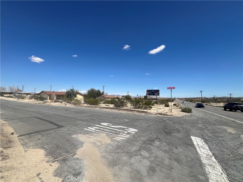 TWO PARCELS – PRIME HIGHWAY FRONTAGE!
A total of 15,600 sq.ft. of Commercial General (CG) zoned land located at the high-visibility corner of Palm View and Highway 62 in the sought-after Four Corners neighborhood of 29 Palms. This location boasts excellent exposure on Twentynine Palms Highway — the main artery through the desert — just minutes from Downtown 29 Palms, Freedom Plaza, and less than 3 miles from the Joshua Tree National Park back gate.
Power at the rear. Water along the highway frontage. Ideal for a visionary commercial project or long-term investment. Both parcels to be sold together. Address for reference only. Buyer to verify all utilities and zoning with the city.