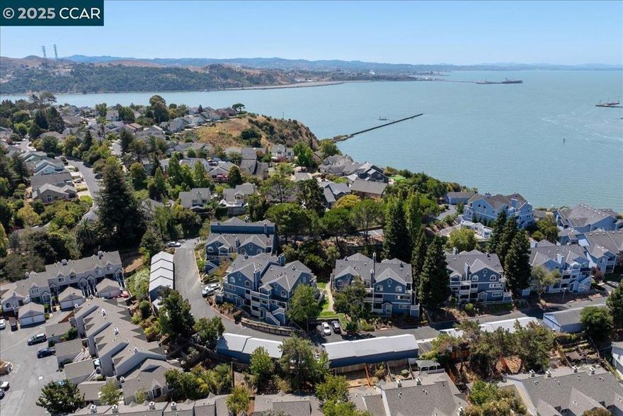 Welcome to 219 Sea Crest Circle! This updated 2 bedroom, 2.5 bath condo offers 1,464 sq ft of stylish living in a desirable South Vallejo community. The bright living room features soaring ceilings, large windows, and a cozy fireplace. The remodeled kitchen includes granite, marble, and tile finishes with modern appliances, opening to a dining space that is flexible enough to convert into a 3rd bedroom if desired. Upstairs, two spacious ensuite bedrooms provide privacy and comfort, with one offering its own balcony retreat. Additional highlights include new carpet, fresh paint, in-unit laundry, updated fixtures, and a one-car garage for parking and storage. Built in 1994, this home blends comfort and convenience in an excellent location near Cal Maritime, ferry access, and major commuter routes. Parks, trails, and Vallejo’s vibrant waterfront are just minutes away. Ideal for first-time buyers, downsizers, or investors seeking a move-in ready home with a functional floor plan and designer touches throughout.