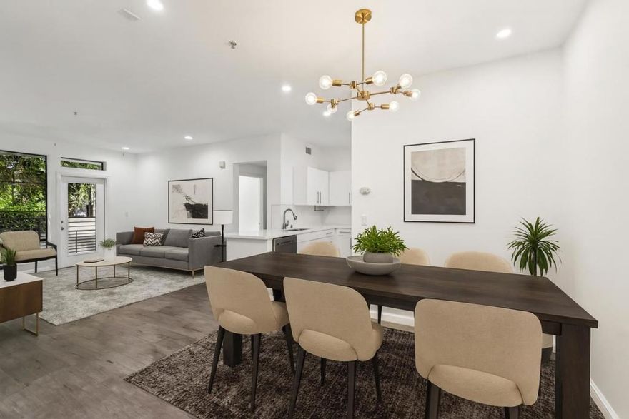 Welcome to this stylish 2 bedroom, 2 bath condo offering 1,000 sq. ft. of modern living in the heart of San Jose. Situated on the ground floor, this home features an open living room and kitchen concept with sleek grey and white tones throughout. The updated kitchen boasts refinished white cabinets, stainless steel appliances, white quartz countertops, and a chic tile backsplash, perfect for both everyday living and entertaining. The bathrooms offer spa like comfort with granite counters, white vanities, grey tile accents, and a soaking tub for relaxation. A private back patio extends the living space outdoors, ideal for morning coffee or unwinding in the evening. Enjoy the convenience of underground parking and a secure, locked building with an indoor mail room for packages. The community provides resort-style amenities including a fitness center, pool, conference/meeting rooms, and moreall designed to enhance your lifestyle. Just minutes from downtown, shopping, and dining.  This home falls within the San Jose Unified School District. Perfectly situated for those seeking a balance of comfort and convenience, this San Jose home is a must-see.