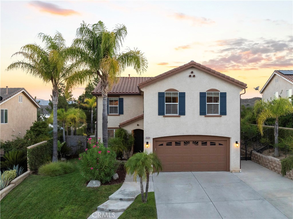 Welcome to this TURN-KEY recently REMODELED home nestled in the highly sought-after Hasley Hills neighborhood of Castaic! Move into immediate energy savings with SOLAR PANELS that will be PAID OFF at closing. This home offers comfort and style and has been tastefully remodeled with newer flooring throughout the entire home, fresh paint, a stunning kitchen, newer light fixtures, and a great floor plan! Your exterior has been refreshed with a newly painted garage door, shutters, and trim while the mature palm trees and blooming flowers enhance the curb appeal. Step inside your freshly-painted, light and bright interior welcoming you with newly installed, luxury plank flooring that creates a clean, modern aesthetic. The heart of the home is the gorgeously updated kitchen with sleek quartz countertops, contemporary beige cabinetry with champagne bronze hardware, a double oven, recessed lights, a pantry, built-in microwave, newer stainless steel appliances and single-basin sink, and a breakfast bar adjacent to the dining area that opens up to the living room. Your powder room and laundry room are also located downstairs. Upstairs you'll find all 4 bedrooms and 2 full baths and newly installed carpet. Your primary suite has raised ceilings, a double-sink vanity, walk-in shower, jetted soaking tub, and walk-in closet. One of your bedrooms could also double as a large bonus room perfect for games, crafts, movie nights, a home office, and features its own cozy fireplace. Your backyard is spacious and private with no rear neighbors and includes a gazebo to enjoy al-fresco dining. The home also features a TANKLESS WATER HEATER in the two-car garage. Located minutes from local parks, shopping centers, top-rated schools, and with easy access to the 5 freeway and highway 126, this Hasley Hills gem is ready for its next lucky owner. Just bring your furniture and start enjoying your new home from day one!
