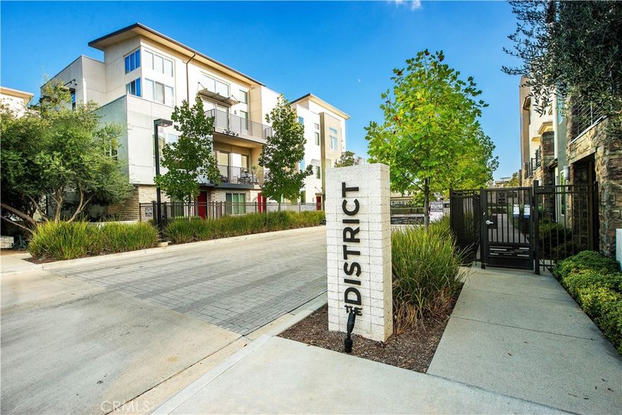 Call listing agent - Sevan Petrossian (818) 521-7309 for access to the entry gate off of Prairie Street and Pearl Lane for open house this weekend 

October 4th and 5th from 1-4 pm.

Welcome to this gorgeous 2-story townhome in The District, one of Northridge’s most desirable gated communities. Built in 2018, this thoughtfully designed residence offers 1,415 square feet of modern living space with no one above or below you. The main level is light-filled and open-concept, seamlessly integrating the kitchen, dining, and living areas into one inviting space perfect for entertaining and everyday living. The kitchen features a large center island, crisp white cabinetry with a built-in coffee/bar station, quartz countertops, stainless steel appliances, and a cozy breakfast nook area. For added convenience, a stylish powder room is also located on the main level. Upstairs, you’ll find a spacious primary suite with a walk-in closet and ensuite bath complete with dual sink vanity, private toilet room, and a step-in shower with a sitting bench. Two additional bedrooms share a hallway bathroom with a shower-tub combination, while the laundry area with washer and dryer hookup is conveniently located on the same level. Additional highlights include a direct-access two-car garage, high ceilings throughout, and a tankless water heater. The District offers resort-style amenities including a sparkling pool and spa, cabanas with outdoor showers, a beautifully designed clubhouse with open-air great rooms, TV lounges, a bar, outdoor kitchen and dining areas, multiple fireplaces, a firepit, BBQ stations, dog park, and lush landscaped lawns. Ideally located in the heart of Northridge, this community is within walking distance of Northridge Fashion Center, Target, Trader Joe’s, and numerous restaurants, movie theaters, and fitness centers. It is also just minutes away from Porto’s Bakery and California State University Northridge (CSUN). Don’t miss this rare opportunity to own something truly special in one of Northridge’s most sought-after communities—schedule your private showing today! Please note that no refrigerator, washer, or dryer are included in the sale (these are virtually staged in the images and video).