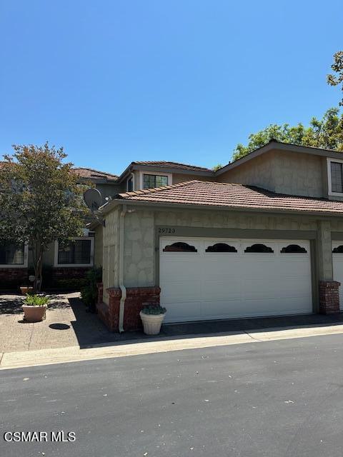 Welcome to 29723 Strawberry Hill Drive, a charming 3-bedroom, 3-bathroom home located in the beautiful and serene community of Agoura Hills. This delightful property offers 1,681 square feet of living space, designed with comfort and style in mind. The property has wood-like flooring throughout. The kitchen has been updated remodeled, as well as one upstairs bathroom, provides a clean and contemporary feel. Three large bedrooms, including one conveniently located downstairs and two upstairs, offer ample space for rest and relaxation. A large laundry room upstairs adds convenience and functionality. A spacious outdoor patio is perfect for entertaining, dining, or simply enjoying the California sunshine. Take advantage of the community pool and tennis courts, providing leisure and recreation options close to home. The home is in close proximity to parks, shopping, and schools, offering convenience and a vibrant lifestyle and is located within the highly acclaimed Las Virgenes Unified School District. This lovely home at 29723 Strawberry Hill Drive offers the perfect blend of comfort, convenience, and community.
