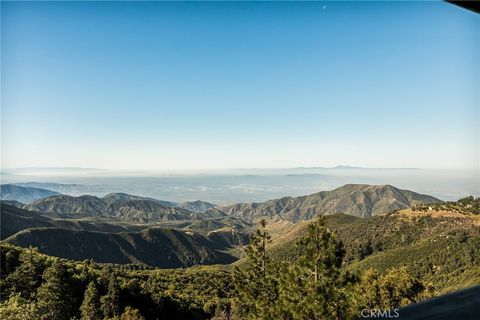 Photo of 31537 Old City Creek Rd, Running Springs, CA 92382 (MLS # IG26112856)