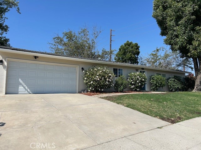 This beautifully upgraded home is nestled in a great East Simi Valley neighborhood. Here are just a few of its many other fine features: Its lush lawn, colorful planters, majestic shade tree, and freshly painted exterior enhance its eye-catching curb appeal . You’ll step into a freshly painted 1,226 square foot open concept floor plan that is in “Move-In-Condition” with recessed lighting, plantation shutters, and wood grain laminate flooring . The spacious combination living/dining room is bathed in natural light from the sliding glass patio door . The family’s cook is going to truly appreciate the kitchen’s abundant soft-close cabinets and drawers, durable deep basin stainless steel sink with custom faucet, and gas range with stainless steel ventilation hood . 4 bedrooms; The main suite has a roomy mirrored closet! 2 beautifully appointed bathroom . Functionally located laundry . Energy efficient dual pane windows will help keep your utility bills low and the interior very quiet . Central heat & air for year-round comfort. BONUS! There is a beautifully finished detached out building that’s perfect for a yoga room, artist studio or play room . You’re going to appreciate and enjoy the large backyard’s tall privacy fencing, mature shade tree, open patio, and the 2 handy storage shed . The ruggedly finished 2 car garage has air conditioning, track lighting, and laminate flooring . All of this is nestled on a sweeping 8,216 square foot corner lot that is close to schools, grocery stores, restaurants, Ranch Simi Community Park, Simi Towne Center, and the 118 freeway .
