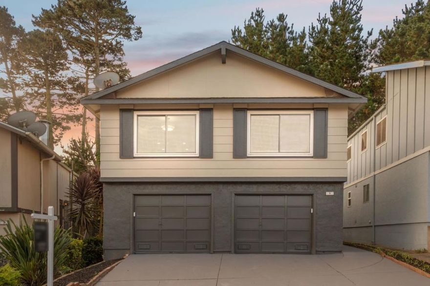 This well-maintained split-level residence offers 1,810 square feet of versatile living space with 3 bedrooms and 3 full bathrooms, Plus a separate family room and a bonus office/guest room. The primary bedroom en-suite is a serene retreat, providing the perfect place to unwind, recharge, and enjoy a little privacy. The freshly painted interior creates a bright, welcoming atmosphere, while a cozy fireplace adds warmth and charm to the living room, ideal for relaxing or entertaining. The home features both casual and formal dining options, with an eat-in kitchen for everyday meals and a separate dining room perfect for hosting gatherings. An additional living area with a full bath offers flexibility, as a guest suite, home office, or creative studio. A separate family room adds even more options for relaxation and private space.  The two-car garage ensures convenience while providing ample storage for everything from outdoor gear to seasonal decor. Perfectly located near Hwy 280, Hwy 1, shopping, and Gellert Park, and the San Francisco airport. This home offers easy access to both city connections and neighborhood leisure. Whether you enjoy hosting, working from home, or simply curling up by the fire, 5 Bacon Ct provides a layout that adapts to your lifestyle.