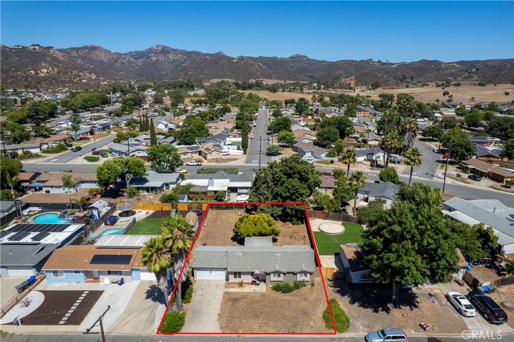Calling all investors & Motivated Buyers! Fixer Upper - An incredible opportunity awaits in Poway's highly sought-after community. This single-family home is one of the lowest priced properties in the area and is ready for a full transformation. Bring your vision and creativity to this 3 bedroom, 1 bath home on a spacious 7,900 sq ft. lot. The mostly original interior provides a perfect blank slate for your renovation ideas. The expansive yard offers endless possibilities, from creating an outdoor oasis to accommodating RV/boat parking or adding an ADU. Located in the award-winning Poway School District, you'll be close to the library, restaurants, shopping, entertainment, & conveniently located near public transportation. This is a rare chance to own a home with no HOA or Mello-Roos in a prime location.