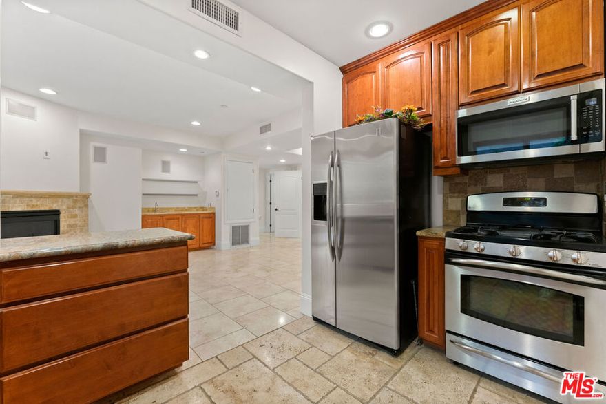 Welcome to Villa Bella, an intimate 21-residence community in the heart of Pacific Palisades. This light-filled, front-facing single-level unit offers 2 bedrooms, 3 bathrooms, and 1,386 sq ft of thoughtfully designed living space. The open layout flows seamlessly from the living room with fireplace to the dining area and chef's kitchen, ideal for both entertaining and everyday comfort.The spacious primary retreat features a sitting area, generous walk-in closet, and spa-style bath with soaking tub, oversized glass shower, and dual sinks. With a secondary bedroom perfect for work from home or guests.Community amenities include a fitness center, residents' lounge, secured entry, elevator, and ample guest parking. With direct-access 2-car garage and only one shared wall, this unit offers both privacy and convenience.Situated moments from Temescal Canyon, hiking trails, the beach, Palisades Village, and highly rated schools, Villa Bella embodies the best of coastal living. In a neighborhood recently tested by fire, the community stands strong renewed and thriving as one of LA's most desirable places to call home.