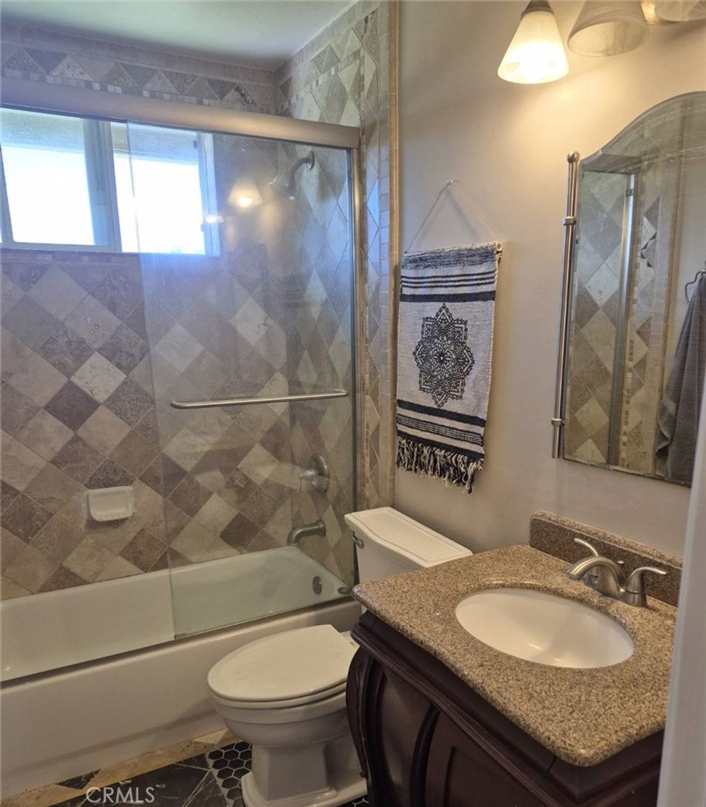 Photo of 11871 Topaz Cir, Garden Grove, CA 92845 (MLS # OC26091031)