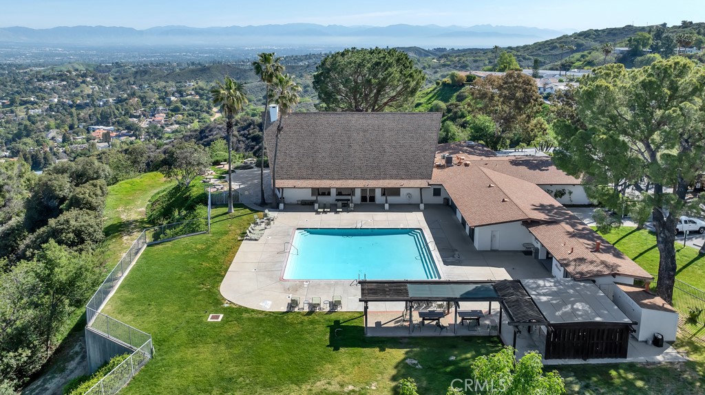 Spectacular value, never leased previously: nestled in the serene heights of Topanga, this exquisitely remodeled single-story home offers the perfect blend of tranquility & luxury. Surrounded by lush greenery, this talented European artisan's private retreat has over $200,000 in refined upgrades. Japanese-style entrance stairs lead to a spacious L/R filled w/natural light. The stunning kitchen features a solid walnut center island w/prep sink, stainless steel appliances, custom white lacquer cabinets w/generous pantry pull-out & farm house sink. Gatherings illuminated by a Velux vented skylight which gives the adjacent living room warmth & brightness. The optimal 1,736 sqft floor plan incl a sophisticated dining room perfect for entertaining, a lage family room & new heart pine wood flrs throughout. Recessed lighting add to the stylish ambiance. The secondary bdrooms have their own wing & are serviced by a beautifully updated bathroom w/rainfall shower, glass tub doors & charming floor tile frm Spain & elegant white Calacatta quartz vanity.
The Master Retreat offers a luxurious escape w/ custom mahogany millwork, incl. closet doors, casing & moldings. The Master bath offers a stone shower base & rainfall features, hand-crafted walnut cabinets & dimmable mirrors. The convenient interior laundry room includes abundant storage & opens to an enchanting, sun-drenched patio. Surrounded by grapefruit, peach, olive & Japanese magnolia trees, the outdoor space also features vegetable planters w/ a Bluetooth automatic drip system, perfect setting for you to enjoy magical evenings w/ soft outdoor lighting. A new metal toolshed helps w/ storage.
Located in a secure, gated & upgraded community, you own the land in fee simple w/a community rider in common ownership w/ 220 other properties. Large pool w/ panoramic views, spa, gym, library, playground, car wash, picnic areas, hiking trails & breathtaking viewing space. Perfectly positioned minutes from top-rated schools, shopping, eclectic dining options in Calabasas & Woodland Hills & easy access to Malibu, Pepperdine, PCH, & the Westside via scenic canyons. The Warner Center & business hubs are nearby & the beach is jst 15 minutes away. Your unique opportunity to own an ultimate blend of peace, luxury & convenience. Also for sale at $749,000: good credit, references & proof of funds required. Absolute must see, schedule yr viewing today & ask us about versatile financing options w/ small assumable loan!