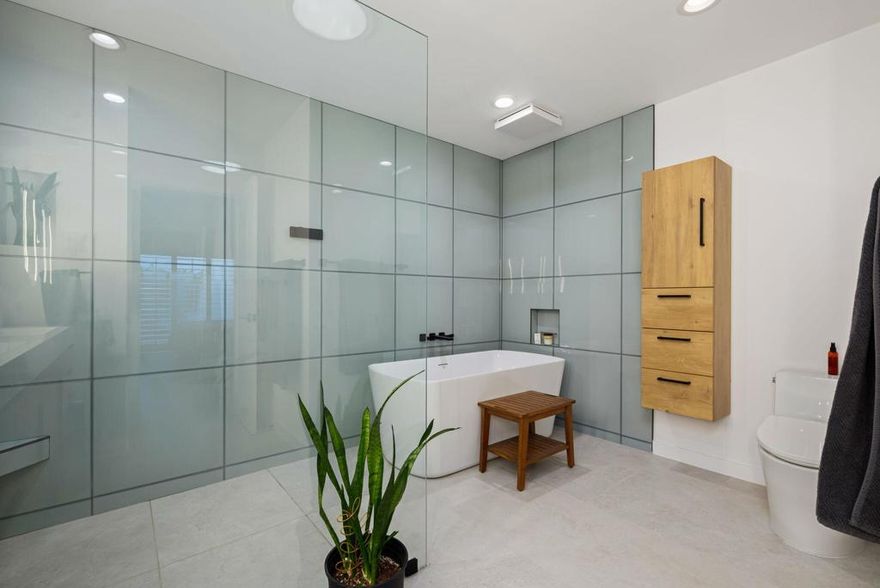 PRICE IMPROVEMENT on this meticulously remodeled Beauty!Welcome to PGA West! The Western Home of Golf. This popular Champion 4 floor plan End-Unit with a Southeast-Facing rear patio allows for great morning sun and stunning mountain views, and sits on the Par 3, #4 Green of the PGA West Stadium course. This Condo features tall ceilings, has 3 Bedrooms and 3 Bathrooms, and has been recently remodeled throughout. If you are looking for a move-in ready home, look no further! Improvements include, but are not limited to;48'' x 24'' Borgo Luce tile flooring throughout, a kitchen remodel with Silestone quartz slab counters, KitchenAid stainless appliances including an electric cooktop, new Schulker cabinetry throughout, and partial wall removal between kitchen and great room.  All Bathrooms have quartz counters/tile flooring and new Kohler plumbing fixtures and bidet toilets, with the Primary Bathroom featuring new Solar Tube Lighting.The home has a New Fiberglass Front Door, new Milgard kitchen windows and kitchen sliding glass doors, all low-E, with new interior doors and trim.  All New MinkaAire Fans in the Bedrooms, Living and Patio.  All New electric switches have been installed throughout featuring timed switches for bathroom vent fans.  All Closet World custom closets in the Primary walk-in, as well as the hallway and 3rd bedroom/office.  Most furnishings are recently purchased and like new. When entering the two-car garage, you will see that it has recently been Armor Chip epoxied, has plenty of racking and cabinetry, as well as 220V 50A power to the garage for EV charging and an updated and insulated garage door. This one checks all the boxes with a full remodel, a community pool steps away and proximity to the Clubhouse, a short cart ride. Offered furnished per the written inventory. PGA West features 3 Private and 3 Public courses, tennis, pickleball, three clubhouses, restaurants, and more. HOAs include building maintenance, complete landscaping, irrigation water/equipment, exterior paint, roof, cable, internet, trash, and 24-hour guarded gated security.