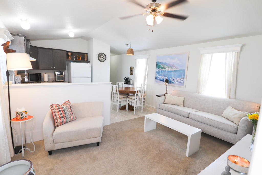 Located in Sunrise Village. Practically new -built in 2022. All age family park, $550 monthly space rent. Situated in Palm Springs San Rafael / and Sunrise area, this 3 bedroom 2 bathroom home is an open floor plan, fenced in, newer AC unit, corner unit, minutes from the downtown strip. Panoramic mountain views. Financing available with as little as 5% down.