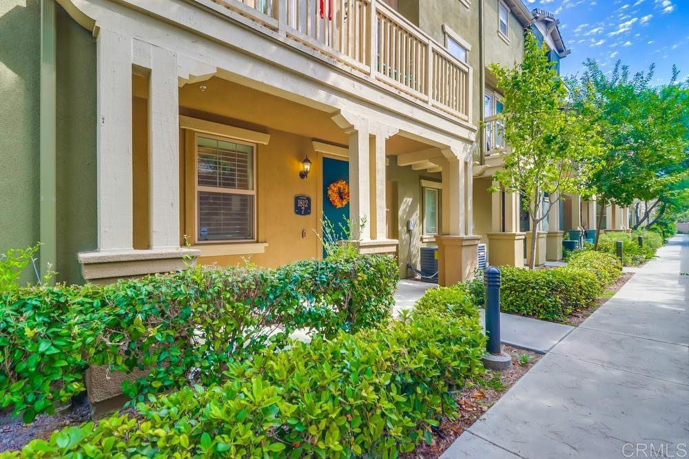 Beautiful 3 Bedroom / 3.5 Bath Townhome in the Mosaic Community! Welcome to this spacious and stylish townhome offering comfort, convenience, and resort-style living. Featuring an open floor plan, this home includes 3 ensuite bedrooms plus an additional powder room on the 2nd floor. The private downstairs ensuite is perfect for guests or multigenerational living. Highlights include, Indoor laundry with washer & dryer included, laminate and wood flooring throughout, spacious living room with a cozy gas fireplace, outdoor balcony for relaxing or entertaining, walk-in closets and extra storage racks in garage (Closets do not convey), upgraded kitchen with stainless steel appliances and ample counter space, whole house water softener system and recently purchased carbon block with sediment filter system for added convenience. The attached 2-car garage provides direct access and plenty of storage. Enjoy all the Mosaic/Tapestry community has to offer with resort-style amenities including a sparkling pool & spa, BBQ areas, clubhouse, playground and gym. Conveniently located near Olympian High School, Wolf Canyon Elementary (in demand and located across the street), All Seasons Park across the street, Otay Ranch Town Center, shopping, and restaurants. This home truly combines modern comfort with a vibrant community lifestyle!