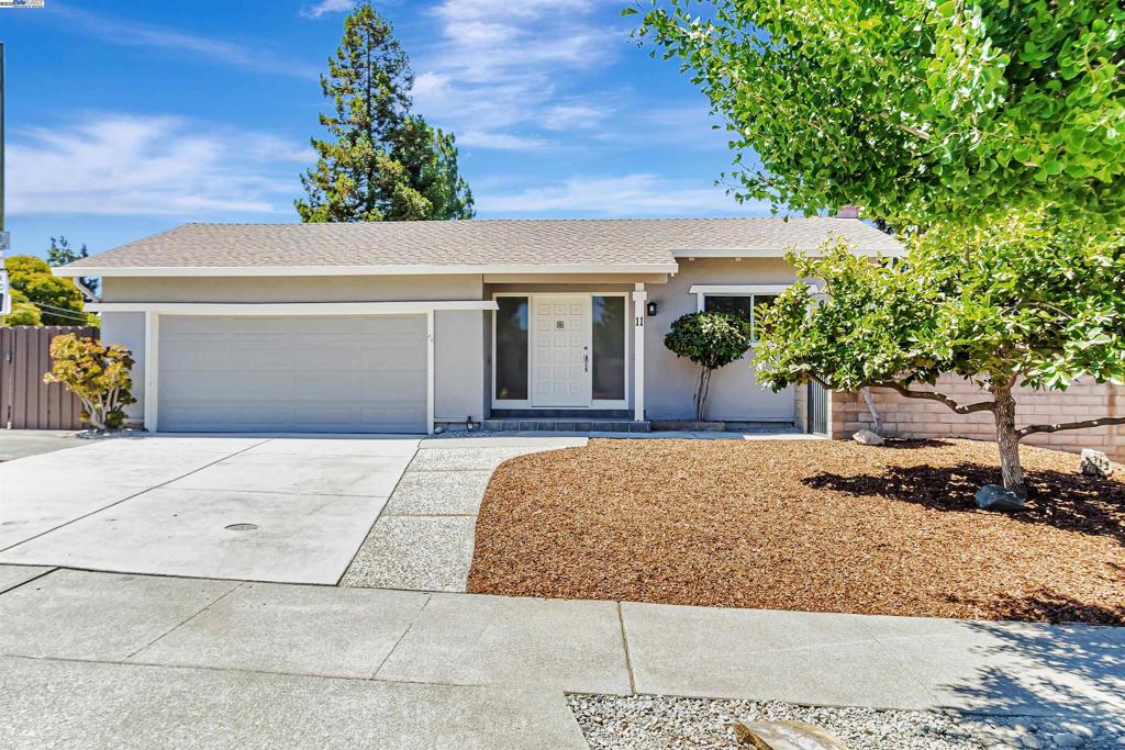 Welcome to 11 Jim Elder Drive, a captivating retreat nestled in the heart of Campbell. This bright and airy home offers three bedrooms, two bathrooms, and approximately 1,603 square feet of thoughtfully designed living space. The moment you step inside, you're greeted by a spacious living area with soaring vaulted ceilings and exposed beams that effortlessly flows into the dining area. Sliding doors open to a serene backyard patio, creating a seamless connection for indoor-outdoor living. The updated kitchen presents a fantastic opportunity to create your dream culinary space. Adjacent to the kitchen, a sun-filled family room also opens to the backyard, providing a peaceful escape and an ideal spot for entertaining. The private primary suite features an en-suite bath and sliding doors leading to a secluded courtyard. Two additional bedrooms are tucked away down a separate hall, offering privacy and a perfect layout for family or guests. The expansive backyard is perfect for summer evenings and gatherings, featuring a refreshing swimming pool and ample space for relaxation. Located just one mile from the vibrant shopping and dining of Downtown Campbell, this home provides convenient access to local parks, top schools and major tech companies.