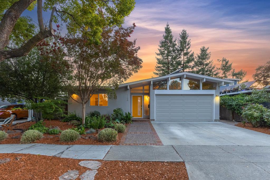 Extensively rebuilt in 2000, this stunning Eichler sits on a pristine, tree-lined street in the highly desirable Fairwood Eichler neighborhood, steps to Red Morton Park. This home has 1800 sf of living space on a 5709 lot and has been expanded from the original floor plan to 4 generous bedrooms and 2.5 baths. The light-filled great room displays the original Eichler style with floor-to-ceiling windows, vaulted tongue in groove ceilings, a slider to the back patio and yard, and engineered wood flooring. The kitchen, opens to the great rm, has a dining bar, a generous dining area with a slider to the side yard, granite countertops, & stainless appliances. The primary suite has its own slider to the garden, a walk-in closet, a beautifully remodeled bath with contemporary vanity and a shower with quartz walls. There are 3 additional bedrooms, an updated hall bath, & a powder room. The rear yard is a show stopper w/ an expansive stone paved patio, large grassy area for recreation, and a Yurt. Amenities include skylights, engineered wood floors, quartz and granite finishes, radiant heat, a two car attached garage with tons of natural light. This wonderful home is close to parks, schools, restaurants, shops, minutes to downtown RWC, Meta, Google & all Silicon Valley has to offer.
