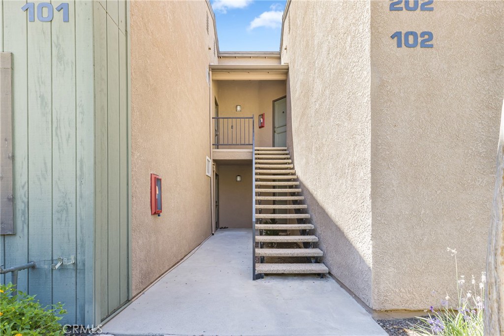 Welcome to 2596 Avenida Del Vista, a beautifully updated 2-bedroom, 2-bathroom condo located in the highly sought-after Crown Villas community of Corona, CA. Nestled near the foothills of the Cleveland National Forest, this home offers a perfect blend of comfort, convenience, and scenic living. Step inside to find an open-concept layout connecting the kitchen to the dining room & living area, ideal for both everyday living and entertaining. Sliding doors to a private balcony invite in natural light and showcase stunning mountain views, creating a peaceful and airy atmosphere. The home also includes in-unit laundry, central heating and air, and tasteful upgrades throughout. Residents of Crown Villas enjoy resort-style amenities including a community pool and spa, fitness center, tennis and basketball courts, clubhouse, dog park, and beautifully maintained green spaces. Located just minutes from golf courses, hiking trails, shopping, dining, and top-rated schools within the Corona-Norco Unified School District, this home is ideal for first-time buyers, downsizers, or anyone looking for a low-maintenance lifestyle with access to nature and modern comforts. Whether you're sipping your morning coffee on the balcony or enjoying the many community perks, this condo offers the peaceful Southern California lifestyle you've been searching for.