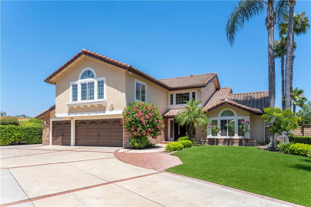 Elegant 5-Bedroom Home in the Via Verde Community! Located at the end of a private cul-de-sac, this beautifully upgraded home offers a perfect blend of timeless finishes and everyday comfort. The spacious layout includes a main-floor bedroom with direct access to a bathroom ideal for guests, multigenerational living, or a home office. The kitchen is a true centerpiece, featuring a large island, double ovens, and a premium Viking 6-burner stove designed to impress and built to perform. Upstairs, the spacious primary suite offers a peaceful retreat complete with a private balcony, an ideal spot to enjoy the breathtaking and unobstructed eastern views. Step outside to the beautifully updated backyard where the stunning views continue, and a sparkling pool, spa, and an expansive entertaining space await. Additional highlights include a 3-car garage with epoxy floors, 3 Tesla Chargers, high quality upgrades throughout, and a turnkey condition ready for immediate move in. This is a rare opportunity to own a truly special home in one of San Dimas’ most sought-after communities.