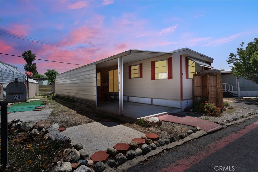 Price Improvement for a Faster Sale! Charming & Move-In Ready! Step into this beautifully maintained single-wide mobile home located in a welcoming 55+ community. This 1-bedroom, 1-bathroom coach offers a clean and comfortable layout with new vinyl flooring throughout and a bright, refreshed feel.
The bonus room is perfect for a home office, formal dining area, or creative craft space—customize it to fit your lifestyle!
Recent updates include: Newer cooling units in the bedroom and near the kitchen. Freshly painted ceilings throughout. kitchen cabinets painted. Roof was resealed last year. New shower and shower backboard: Painted bathroom cabinets and closet door. Fresh paint on the bedroom closet doors
Enjoy relaxing mornings or peaceful evenings on your private covered porch. The large carport provides ample parking, and two storage sheds offer extra space for tools, hobbies, or seasonal items. With its thoughtful upgrades, tidy interior, and inviting outdoor areas, this home is truly move-in ready. Don’t miss this great opportunity to enjoy low-maintenance living in a friendly and quiet community! Schedule a showing today!