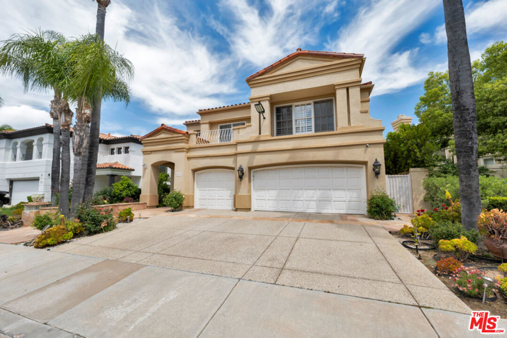 Beautifully updated property on a quiet cul-de-sac within the prestigious guard gated Bellagio community. High ceilings greet you as you enter into this light and bright home with custom finishes throughout, including an expansive chef's kitchen. Perfect for entertaining as the den and living room both open to a large yard area with pool, spa, built in fire pit, and custom bar. The den features a one of a kind wet bar, and easy access to the 3 car garage. Downstairs has a bedroom and en suite bath, as well as a powder room. Upstairs, you have three large bedrooms and two more bathrooms, including balconies on each side of the house. The primary suite features ample closet space and a Jacuzzi tub. Take advantage of everything Calabasas has to offer including the nearby lake, The Commons, and Calabasas swim and tennis center.